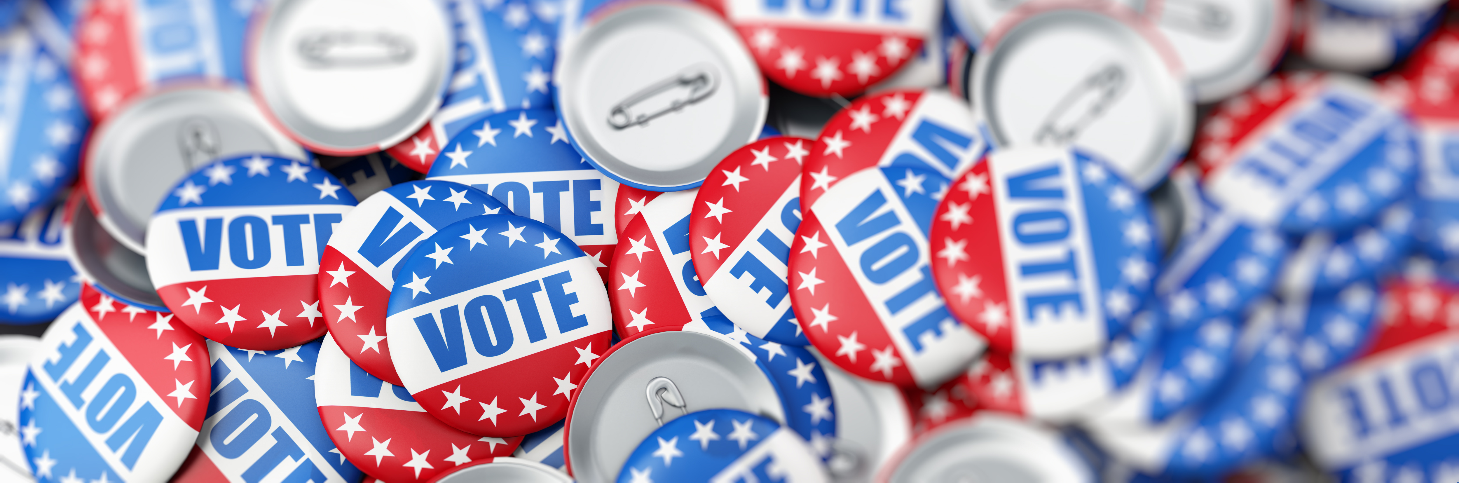Image of pins with Vote on them